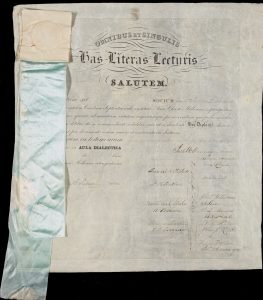 A UNC Diploma from 1793 with blue ribbon indicating membership in Di Society; Southern Historical Collection
