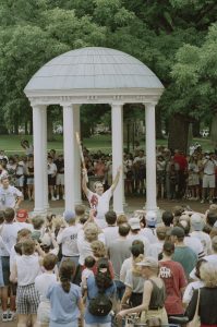 Charles Shaffer, Jr., with the Olympic torch, 23 June 1996. Photo by Dan Sears for UNC News Services.