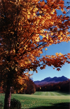 Grandfather Mountain in fall with golf course in foreground, circa 1990s