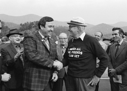 Gov. Bob Scott and Hugh Morton shaking hands, at/near Grandfather Mountain?, circa 1971