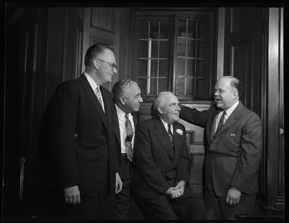 Hugh Morton, photographer Joseph Costa, North Carolina Governor Luther H. Hodges, and radio personality Ted Malone at 21 January 1956 meeting of the Honorary Tar Heels in New York City.