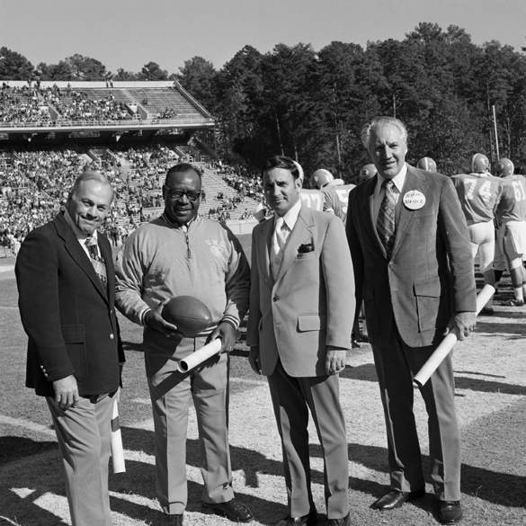 Charlie Justice, Morris Mason, and others at UNC Homecoming game, 1973