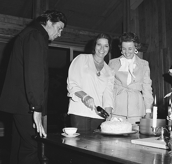 June Carter Cash cuts birthday cake