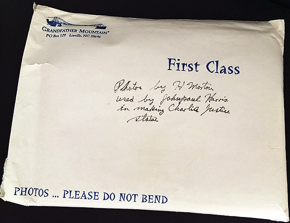 Envelope, labeled by Hugh Morton, containing photographs used by Johnpaul Harris to create the Charlie Justice statue.