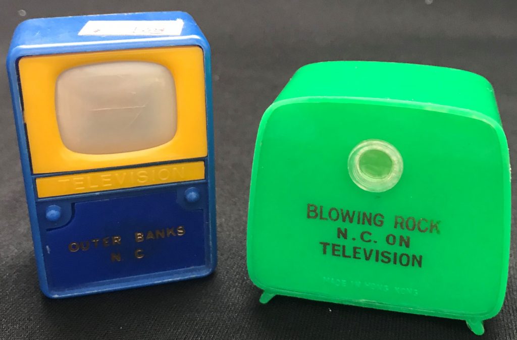 Miniature TVs with images of the Outer Banks and Blowing Rock