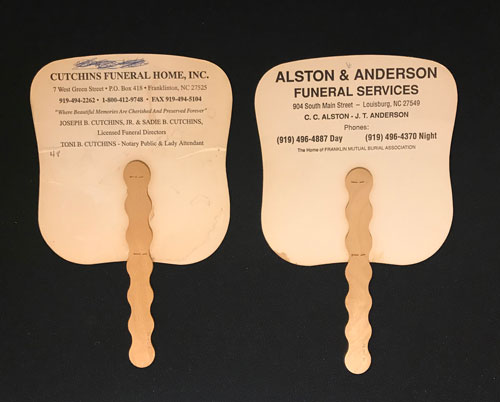 Verso of two fans  with one advertising Cutchins Funeral Home in Franklin, NC and the other advertising Alston and Anderson Funeral Services in Louisburg, NC