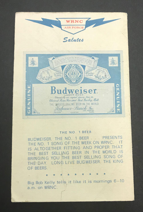 Verso of flyer with WRNC top 50 songs featuring a Budweiser advertisement.