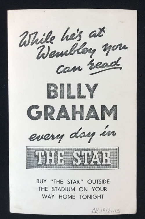Verso of Billy Graham postcard with text encouraging readers to buy the Star newspaper to read about Billy Graham's crusades at Wembely Stadium.