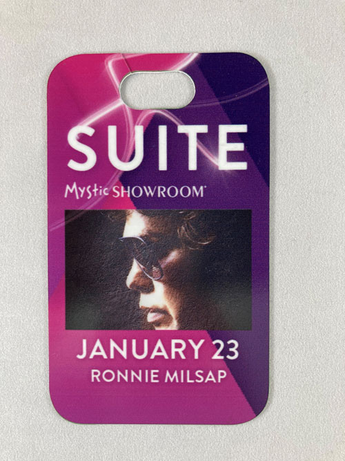 Plastic card with an image of Ronnie Milsap and the words "Suite, January 23, and Ronnie Milsap."
