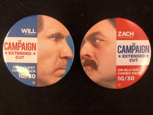 Two pinbacks. One has Will Ferrell's face and the words "Will" and "Campaign." The other pinback has an image of Zach Galifinakis's face and the words "Zach and Campaign."
