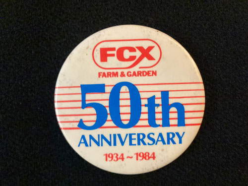 Pinback with words "FCX Farm and Garden, 50th Anniversary, 1934-1984"