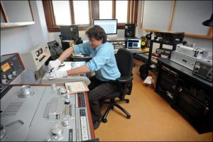 John Loy works in the studio of the Southern Folklife Collection at Wilson Library at the University of North Carolina at Chapel Hill.