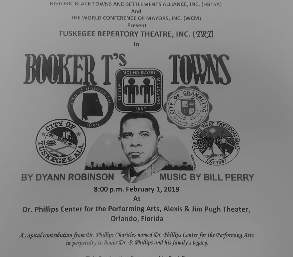 Program for Tuskegee Repertory Theatre's presentation of “Booker T.’s Towns by Dyann Robinson," featuring a central image of Booker T. Washington surrounded by the crests of five historically Black Southern towns: Tuskegee, AL, Hobson City, AL, Mound Bayou, Mississippi, Grambling, LA, and Eatonville, FL