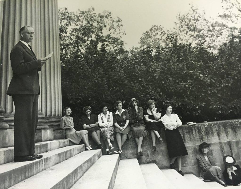 Students listen to the speaker at the observance of the 1933 Nazi Book Burning on the steps of Wilson Library, 1943