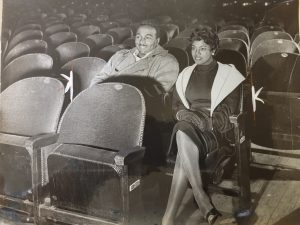 Leslie Scott (Porgy) and Martha Flowers (Bess) sitting in theater