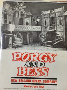 Houses in black and white with the words Porgy and Bess in red
